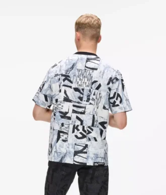 Χαλαρό T-shirt με μονογράμμα σε όλο το μήκος Χαλαρό T-shirt με μονογράμμα σε όλο το μήκος
